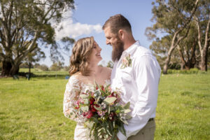 Jasmin and Cameron posing for wedding photographer in Country New South Wales