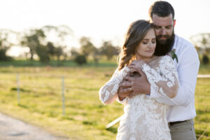Jasmin and Cameron hugging after wedding in Country New South Wales