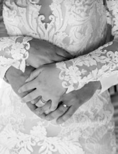 close up photo of bride and groom holding hands at country nsw wedding