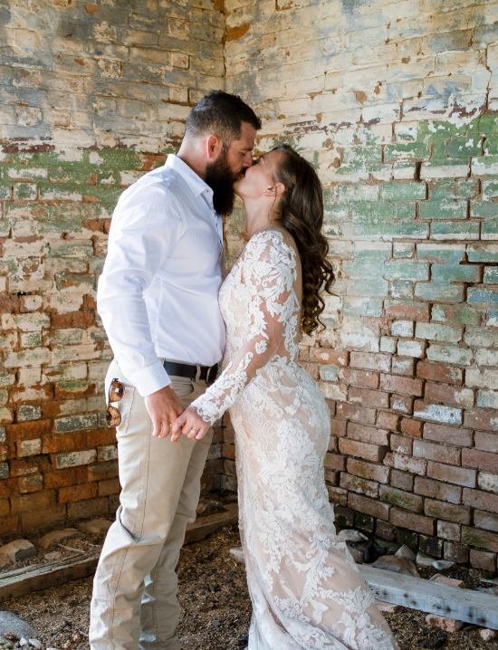 Bride and groom kissing at country NSW wedding
