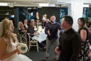 photo of garter toss at Sydney wedding reception