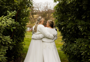 Bride and bride at Hillandale Gardens wedding in Yelthome