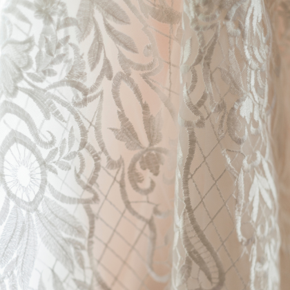 1 Close up photo of brides dress captured by wedding photographer in Camden