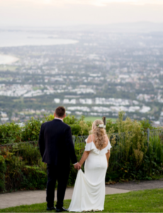 Bride and groom overlooking Sublime point after wedding