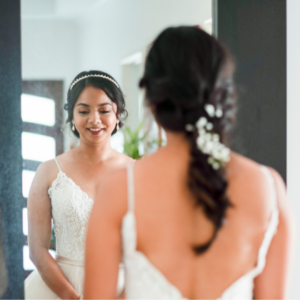 Bride looking at reflection before wedding in Perth, Western Australia