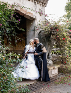 bride and groom kissing at viking themed wedding in Brisbane