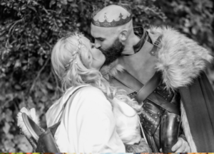 black and white photo of bride and groom kissing at Brisbane viking themed wedding