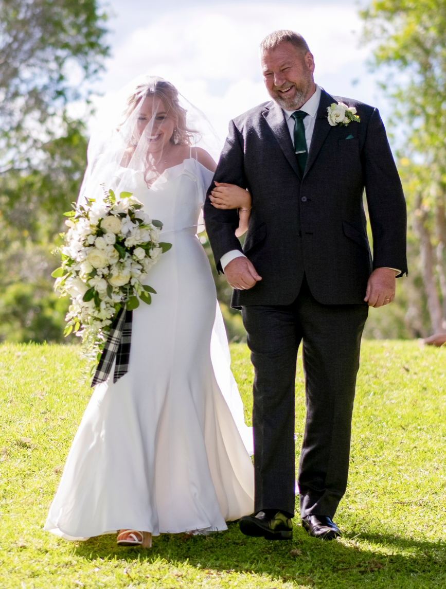 Bride and father walking down aisle at Wollongong wedding