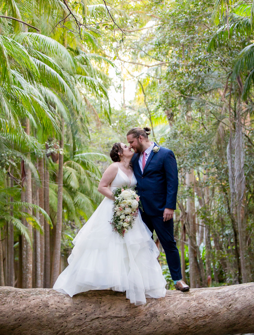 1 Bride and groom over creek at Cedar Creek Lodges Queensland