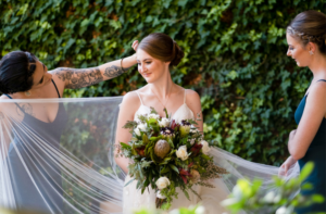 bride holding native Australian bouquet at Cropley House