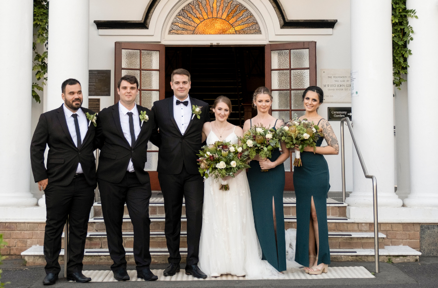 wedding party in front of Cropley House