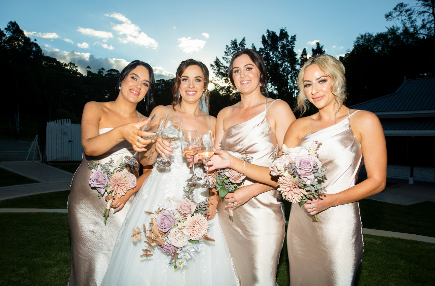 1 bride and bridesmaids at cedar creek wedding captured by wedding photographer