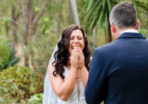 Chelsea and Callum wedding ceremony bride laughing at Rothwood in Perth