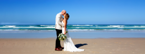 1 bride and groom kissing beach wedding North Coast New South Wales