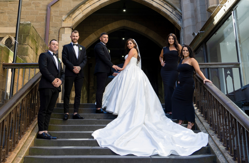 bridal party posing for wedding photographer in Melbourne