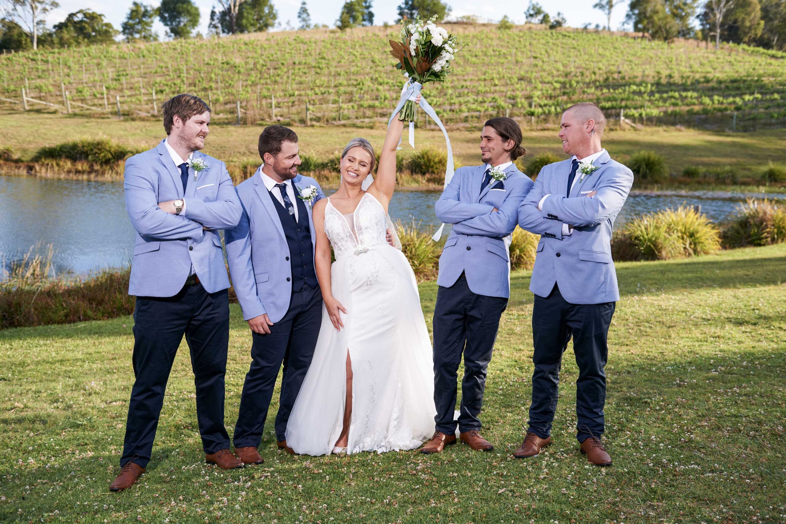 wedding photo of bride and groomsmen at ocean view estates in Brisbane
