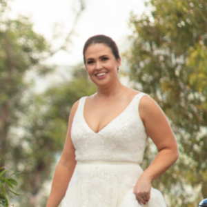 bride posing for photographer at Canberra wedding