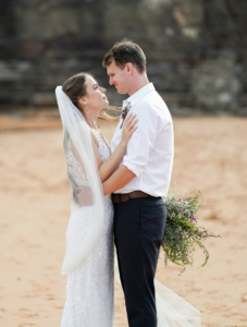 bride and groom at Bilgola beach in New South Wales