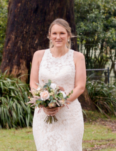 bride photographed walking down aisle at Melbourne wedding