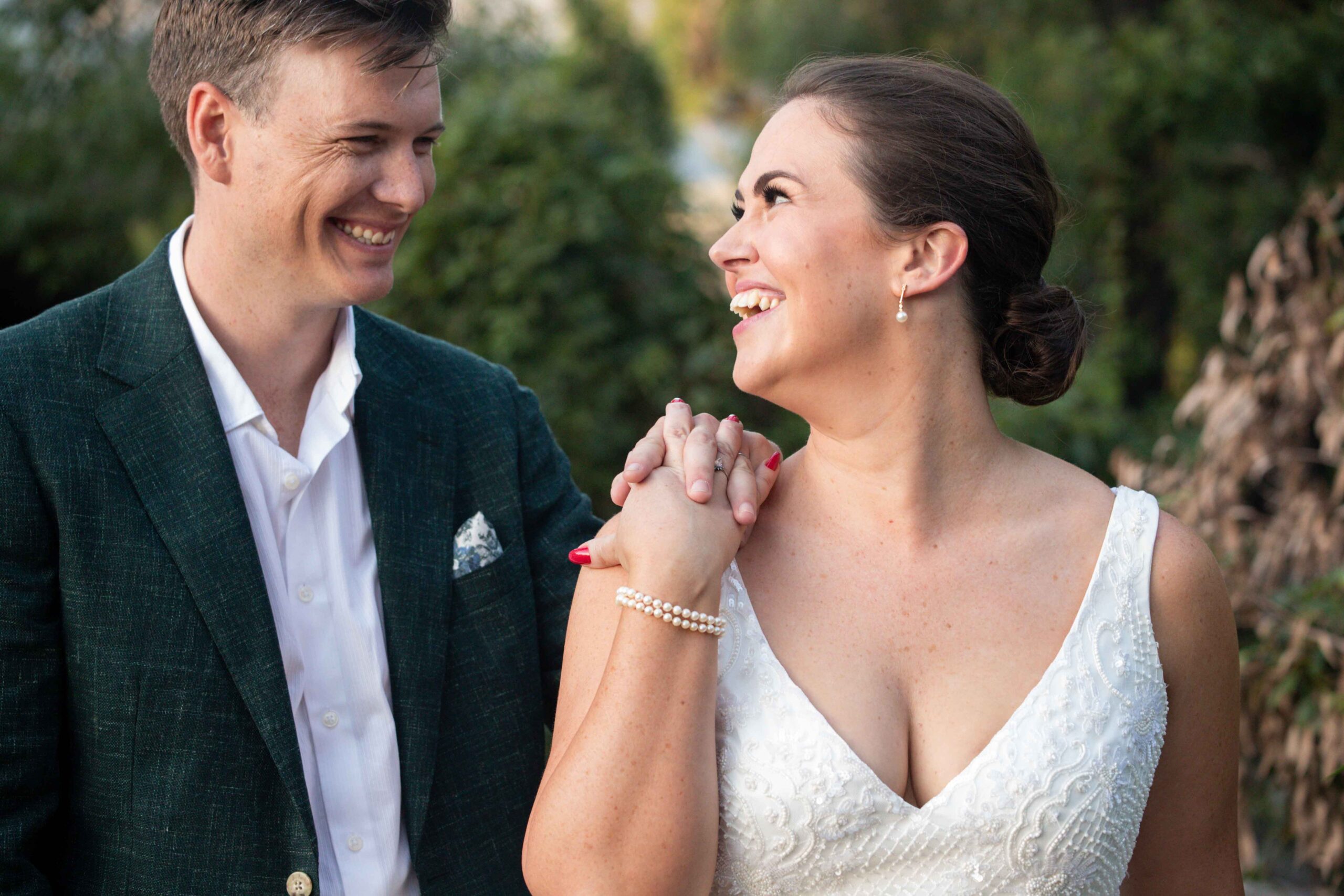 bride and groom laughing after Canberra wedding