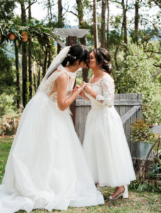 first kiss at Log Cabin Ranch wedding ceremony