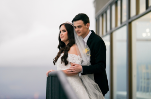 bride and groom posing for wedding photographer at Panorama House in Wollongong