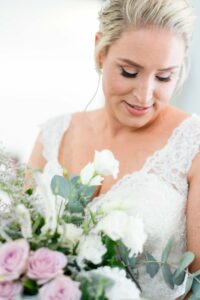 photo of bride with bouquet of flowers