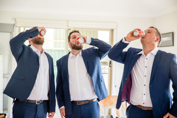 grooms drinking beer before wedding in Perth